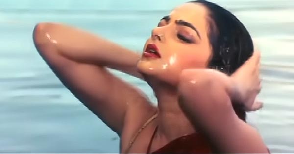 Watch this popular scene of Mamta Kulkarni in red saree taking a bath in river.