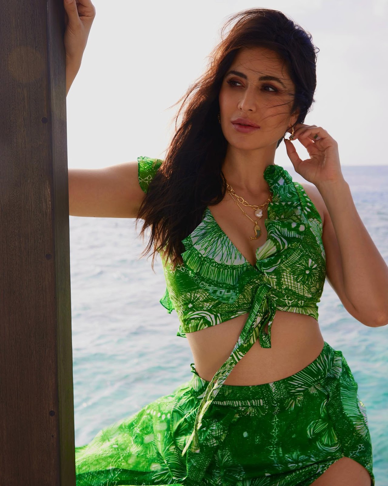 Katrina Kaif green outfit slide ad