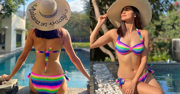 Aahana Kumra flaunts her sexy body in a multi-color bikini and raises heat.