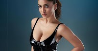 saniya iyappan cleavage black latex dress