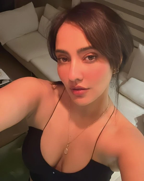 neha sharma cleavage selfie black outfit busty indian actress