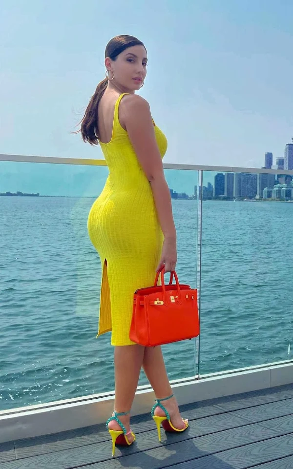 nora fatehi bodycon dress booty curvy body bollywood