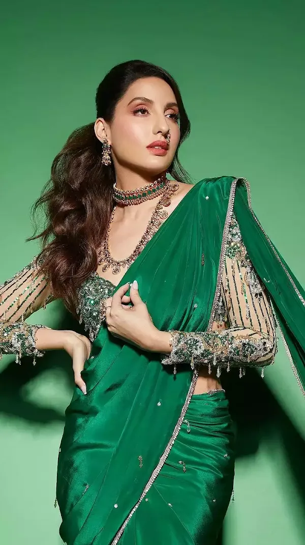 nora fatehi green saree