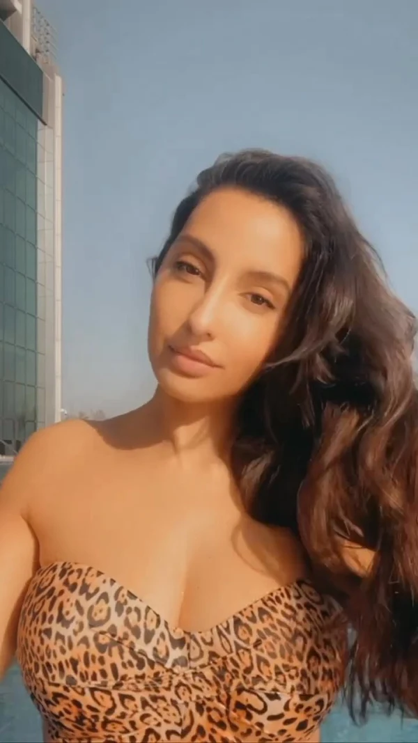 Nora Fatehi bikini cleavage hot