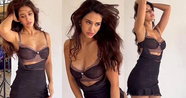 disha patani cleavage short black dress sexy legs