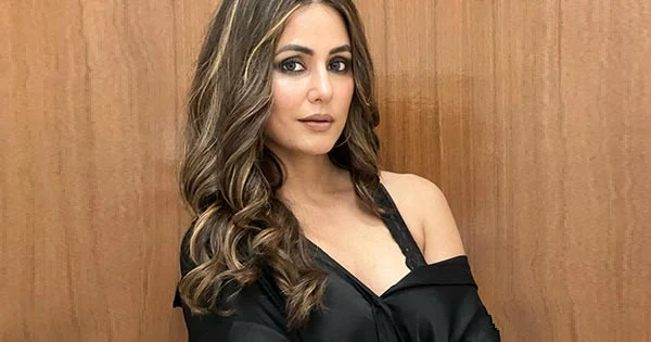 Hina Khan’s smoky hot look in black shirt slipping off her shoulder raises the heat – actress gets trolled.