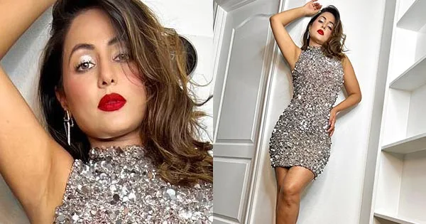 Hina Khan in this short tight fit glittery dress with rosy red lips turns the heat up – see now.