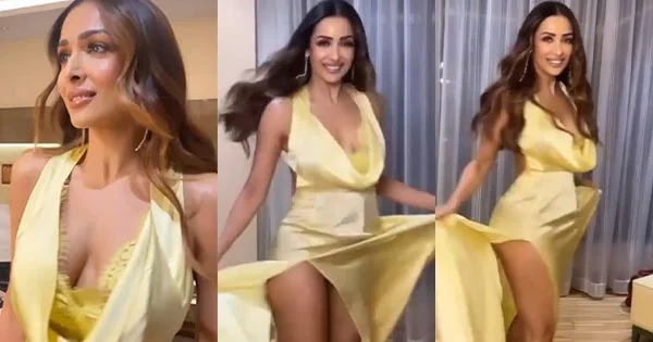 Malaika Arora risky high slit dress legs wardrobe malfunction