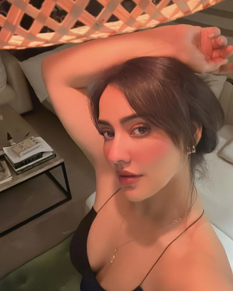 neha sharma cleavage black dress