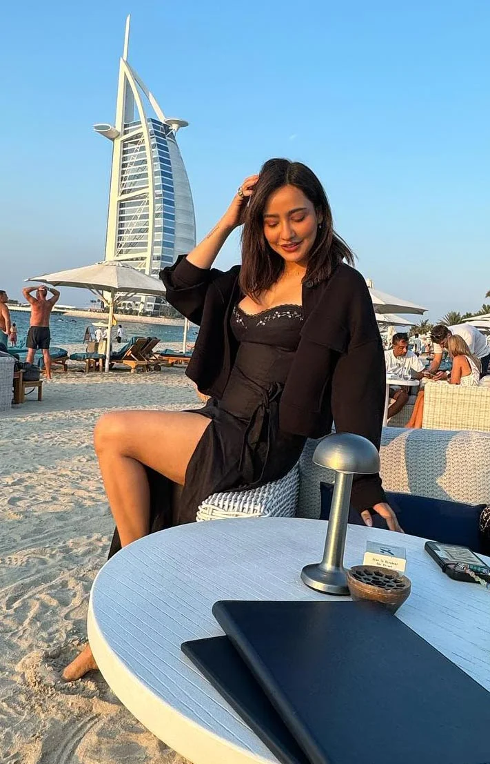 neha sharma cleavage legs black outfit