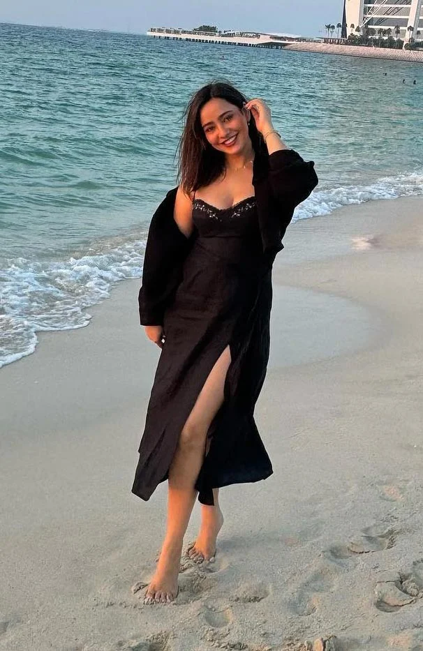 neha sharma cleavage legs black outfit