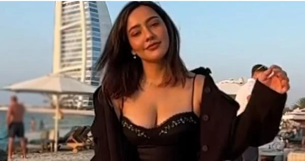 neha sharma cleavage legs black outfit