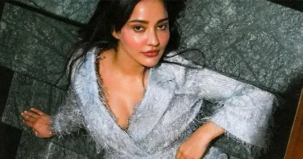 Neha Sharma’s stylish hot avatar in this robe dress revealing her sexy legs – see now.