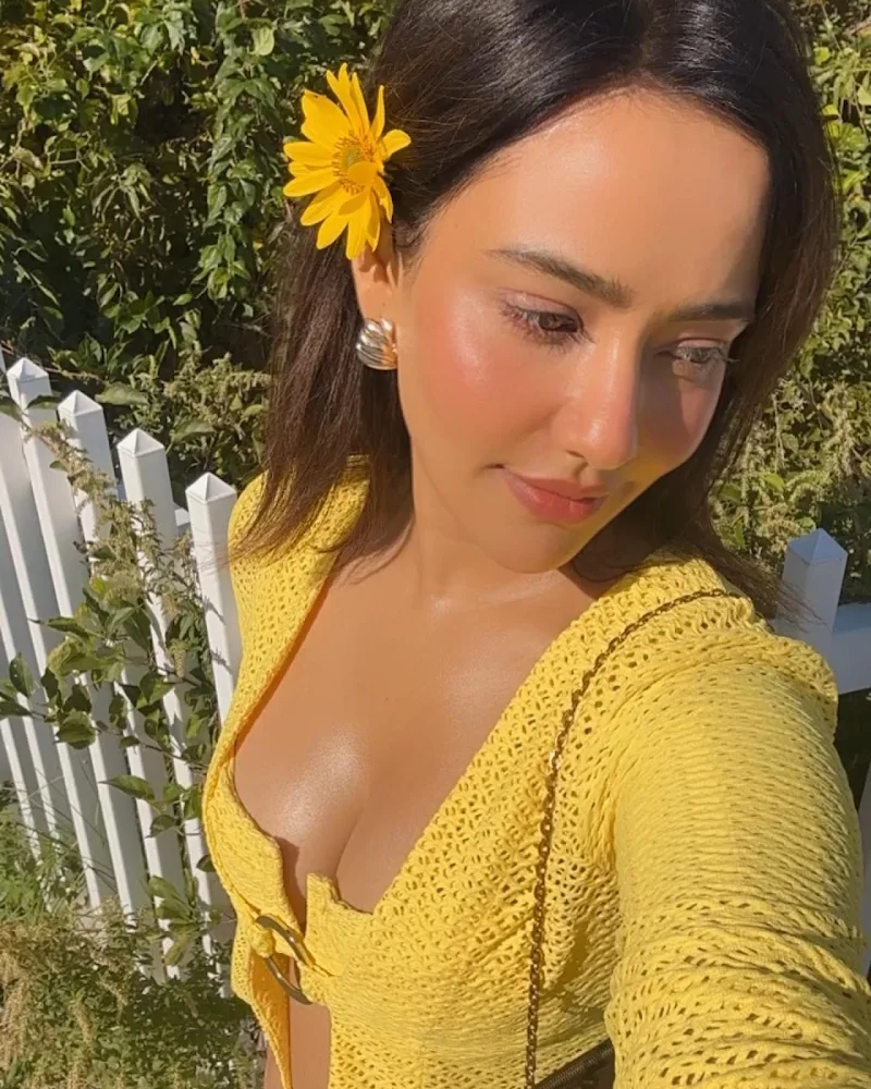 neha sharma cleavage yellow bikini