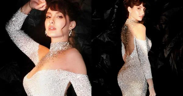 Nora Fatehi in this tight fit thigh high slit dress raised the temperature – see photos.