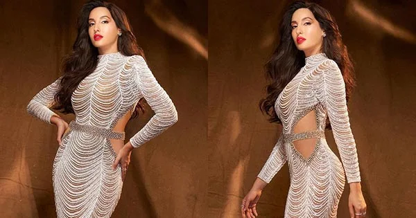 Nora Fatehi flaunts her fine curves in this body hugging white dress – see now.