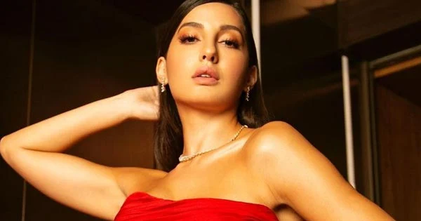 Nora Fatehi flaunts her sexy legs in off shoulder red dress – see hot photos.