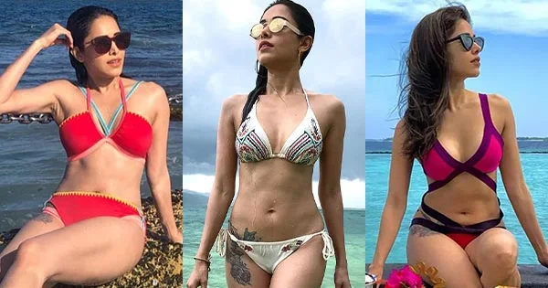 40 hot photos of Nushrratt Bharuccha in bikini and swimsuits flaunting her sexy body.