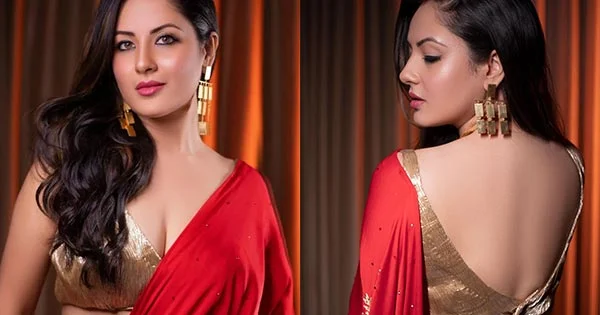 Puja Banerjee in red saree with cleavage baring golden blouse looks stunning hot – see photos.