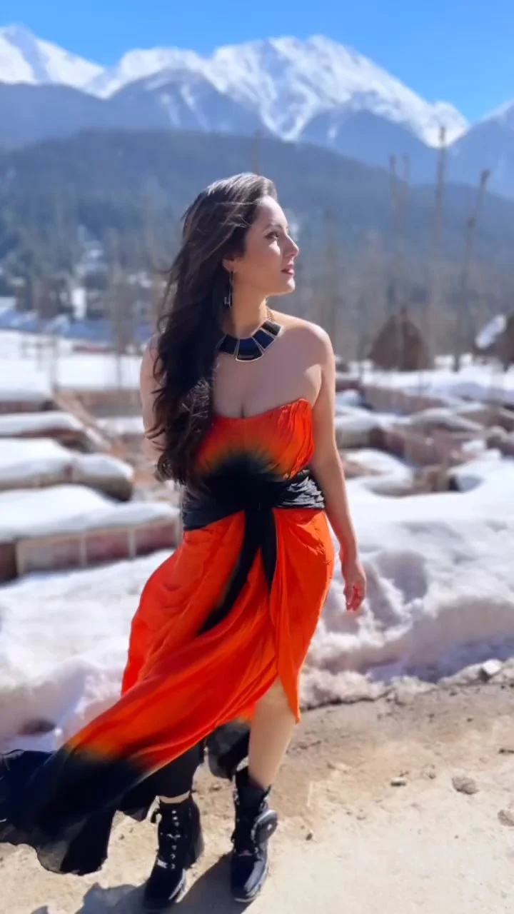 Puja Banerjee cleavage orange dress