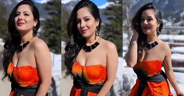 Puja Banerjee cleavage orange dress