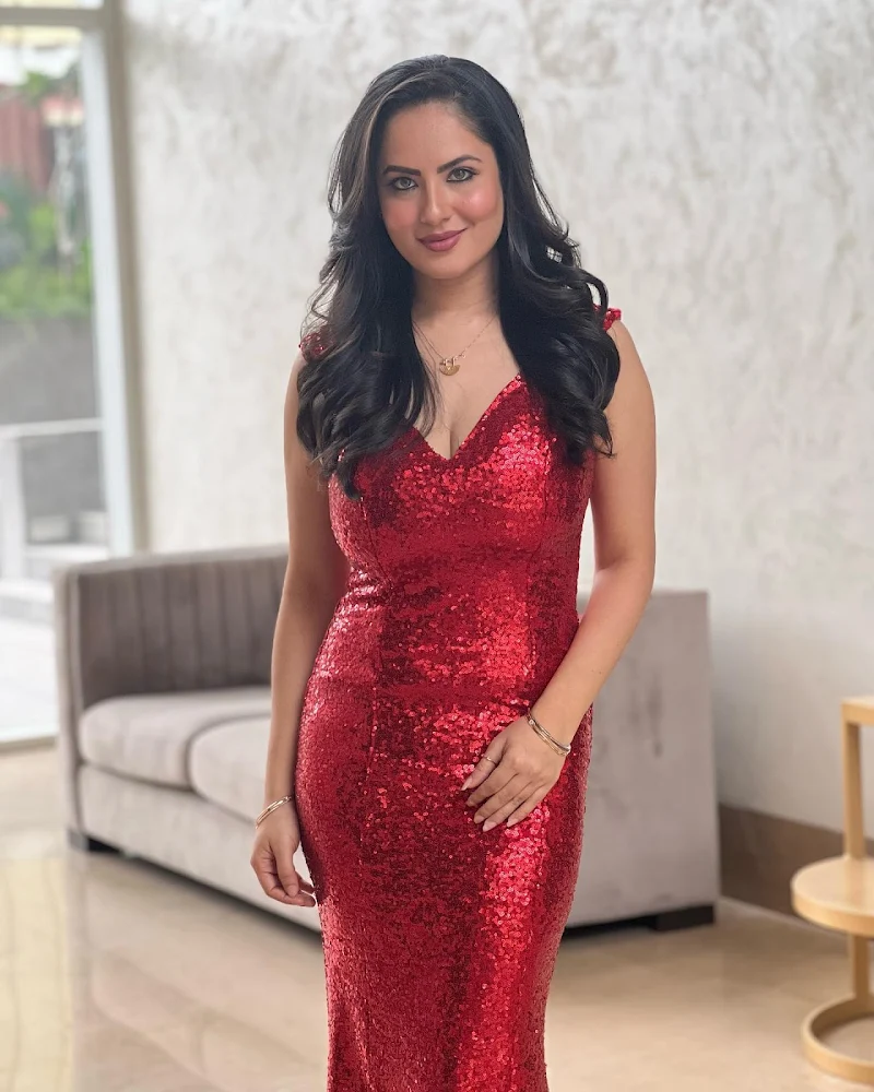 puja banerjee red shimmery dress cleavage curvy