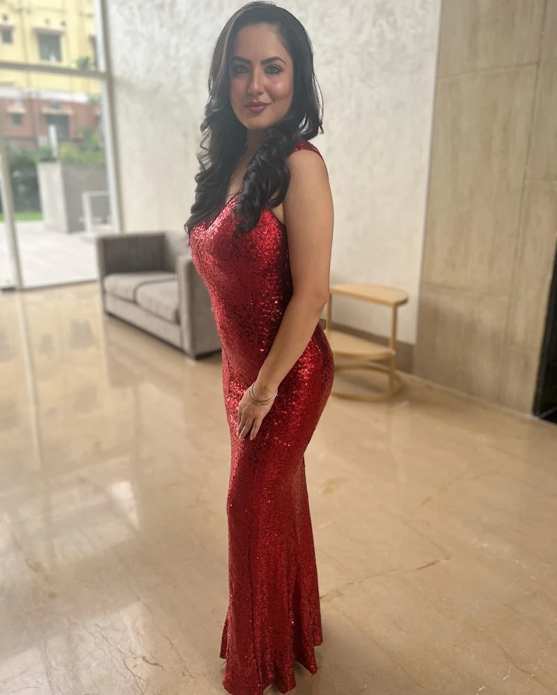 puja banerjee red shimmery dress cleavage curvy