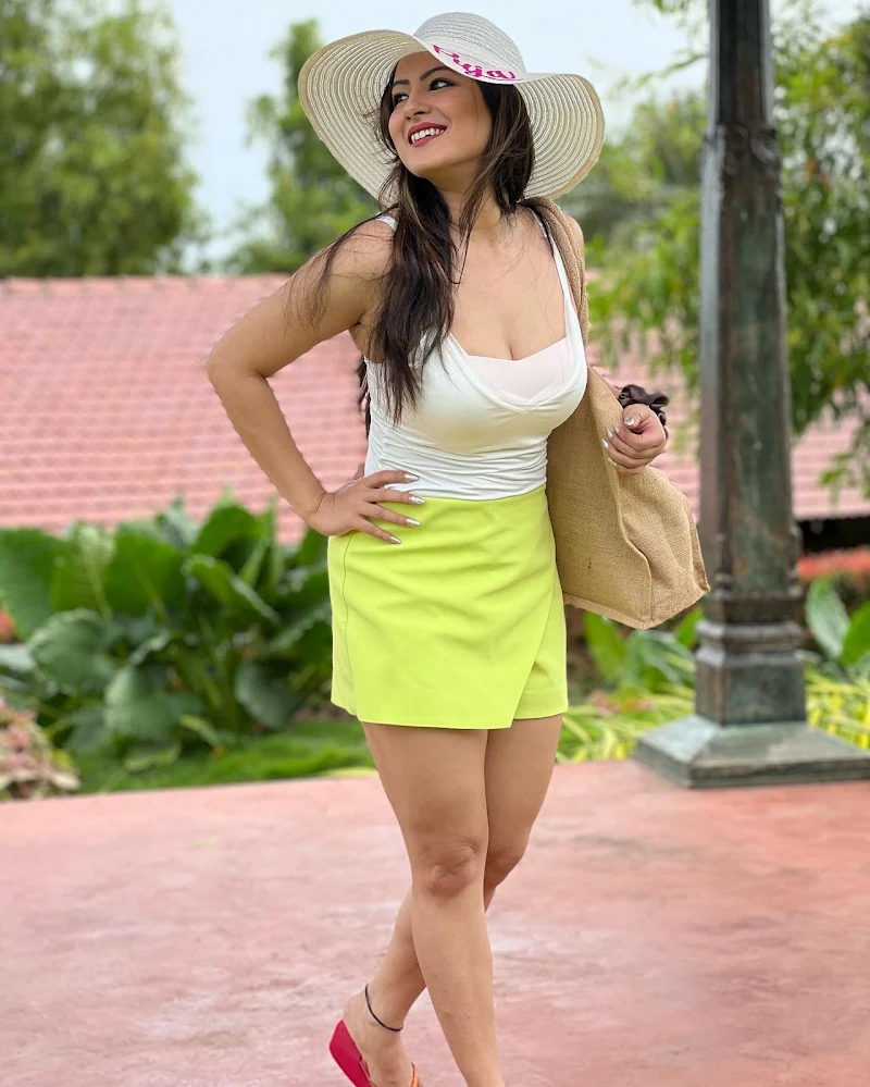 Puja Banerjee cleavage sexy legs shorts