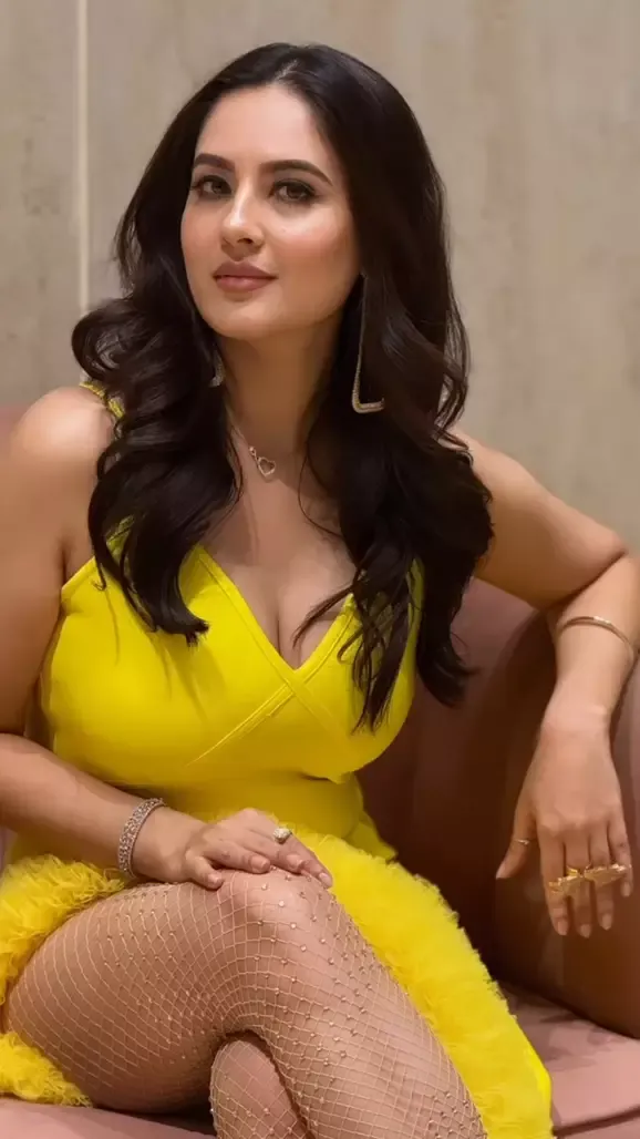 puja banerjee yellow dress legs cleavage