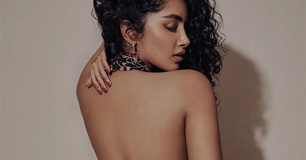 Anupama Parameswaran flaunts her sexy back in this high slit dress – see now.