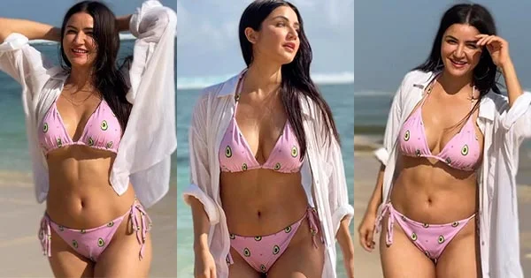 Amy Aela in string bikini flaunts her fine sexy body – watch hot video.