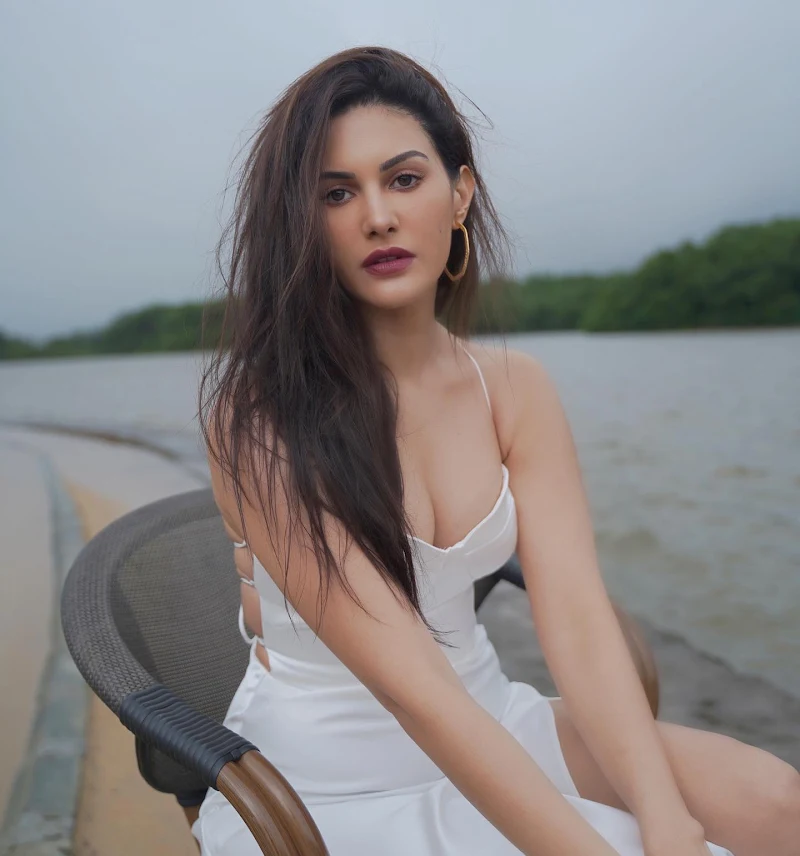 amyra dastur cleavage white satin gown sexy legs