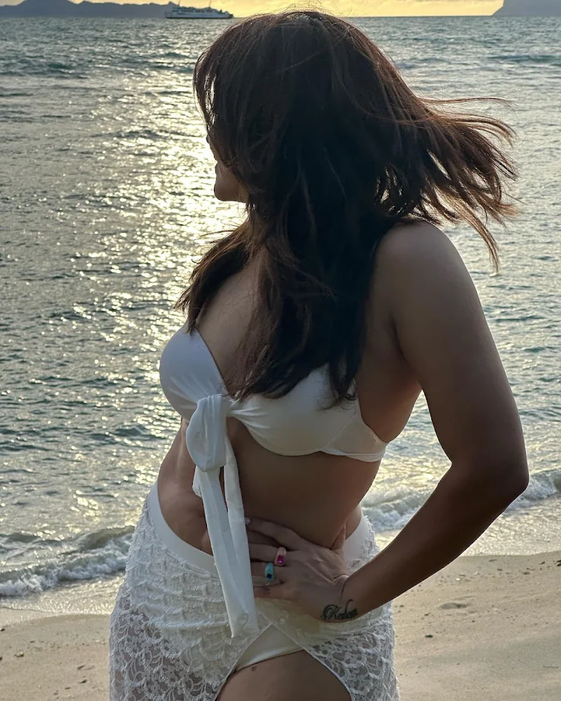 Anasuya Bharadwaj white bikini curvy cleavage navel