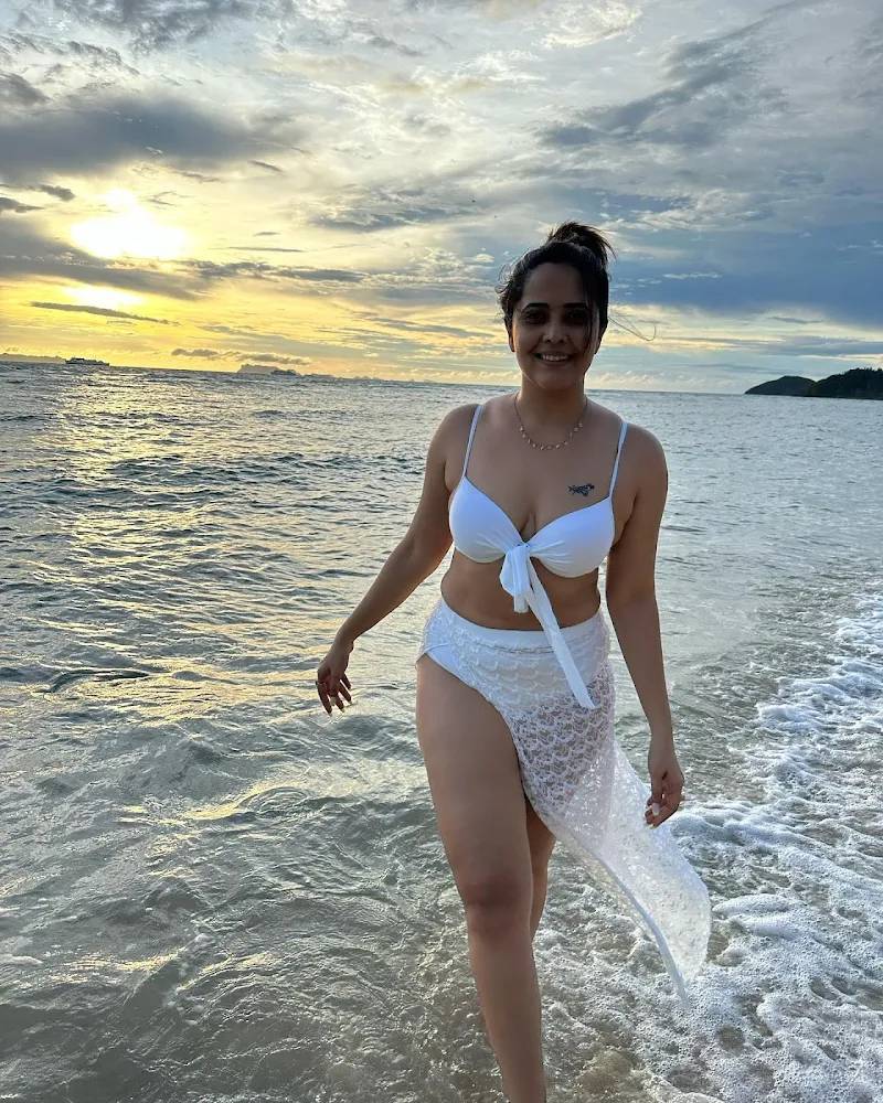 Anasuya Bharadwaj white bikini curvy cleavage navel