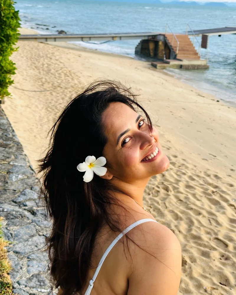 Anasuya Bharadwaj white bikini curvy cleavage navel