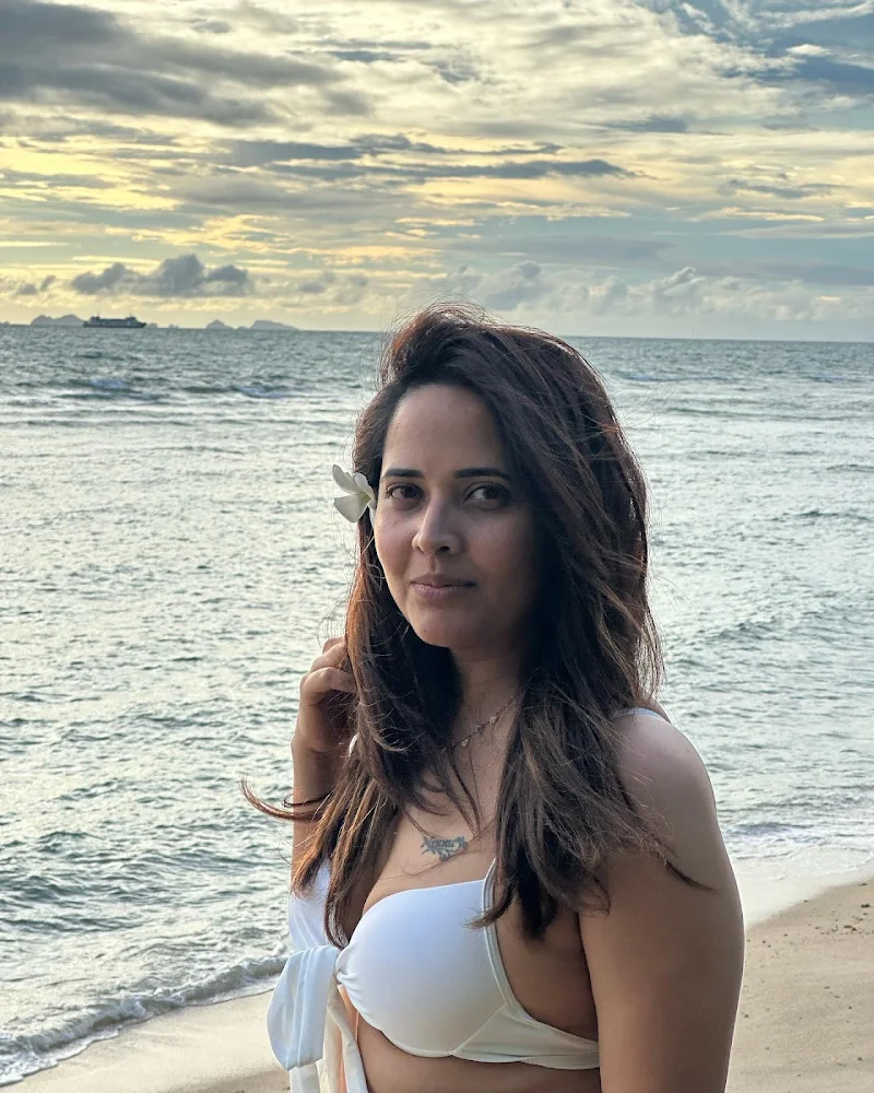 Anasuya Bharadwaj white bikini curvy cleavage navel