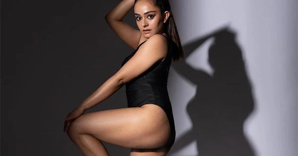 Apoorva Arora in black swimsuit shows off her sexy legs and fine body – see latest viral hot photos.