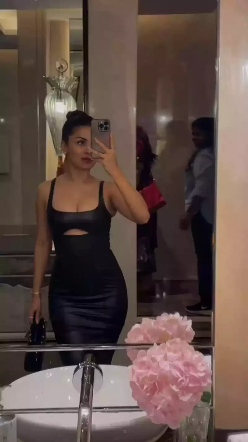 avneet kaur black bodycon dress curvy cleavage selfie