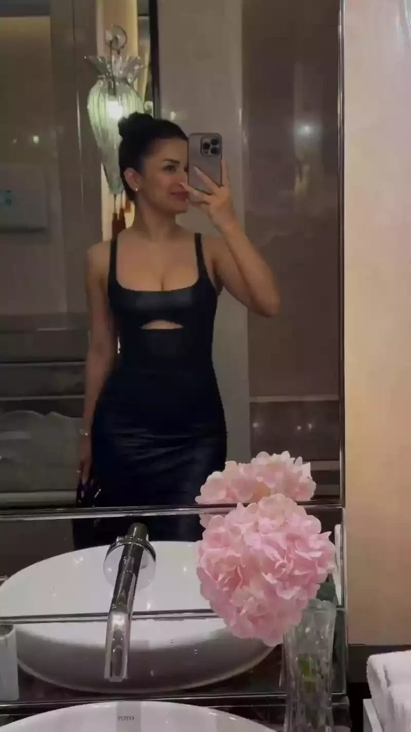 avneet kaur black bodycon dress curvy cleavage selfie