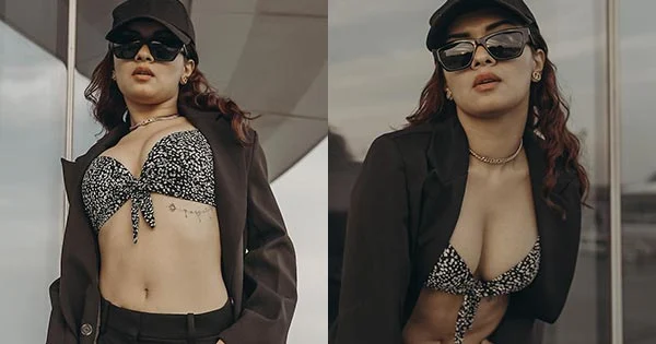 Avneet Kaur is too hot to handle flaunting ample cleavage and fine midriff in a bikini top with an overcoat and pants.