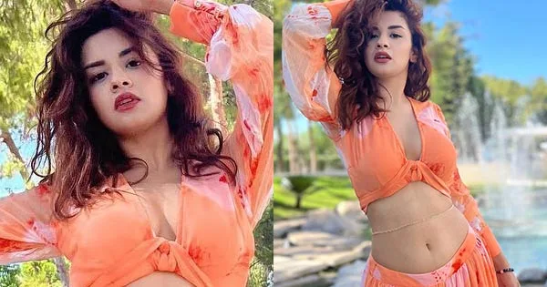 Avneet Kaur flaunts her fine midriff in this flower patterned orange outfit – see photos.