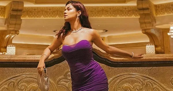 Avneet Kaur flaunts her fine curves in this tight fit off shoulder purple dress – see now.