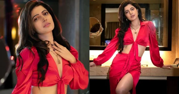 Charlie Chauhan turns the heat up in this high slit red outfit – see now.