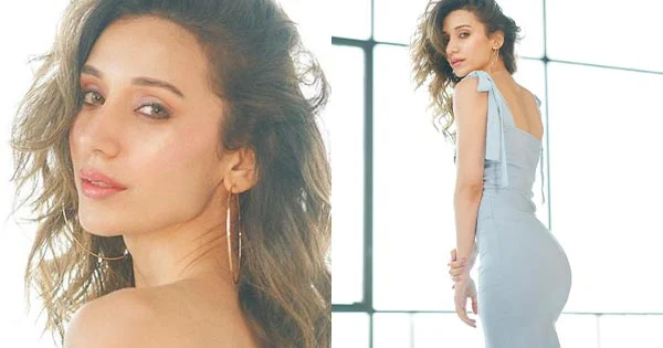 Heli Daruwala in this tight fit dress flaunts her slender figure and looks breathtaking.