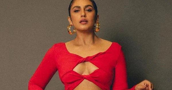 Huma Qureshi in this cleavage baring red cutout dress looked stunning hot – see now.