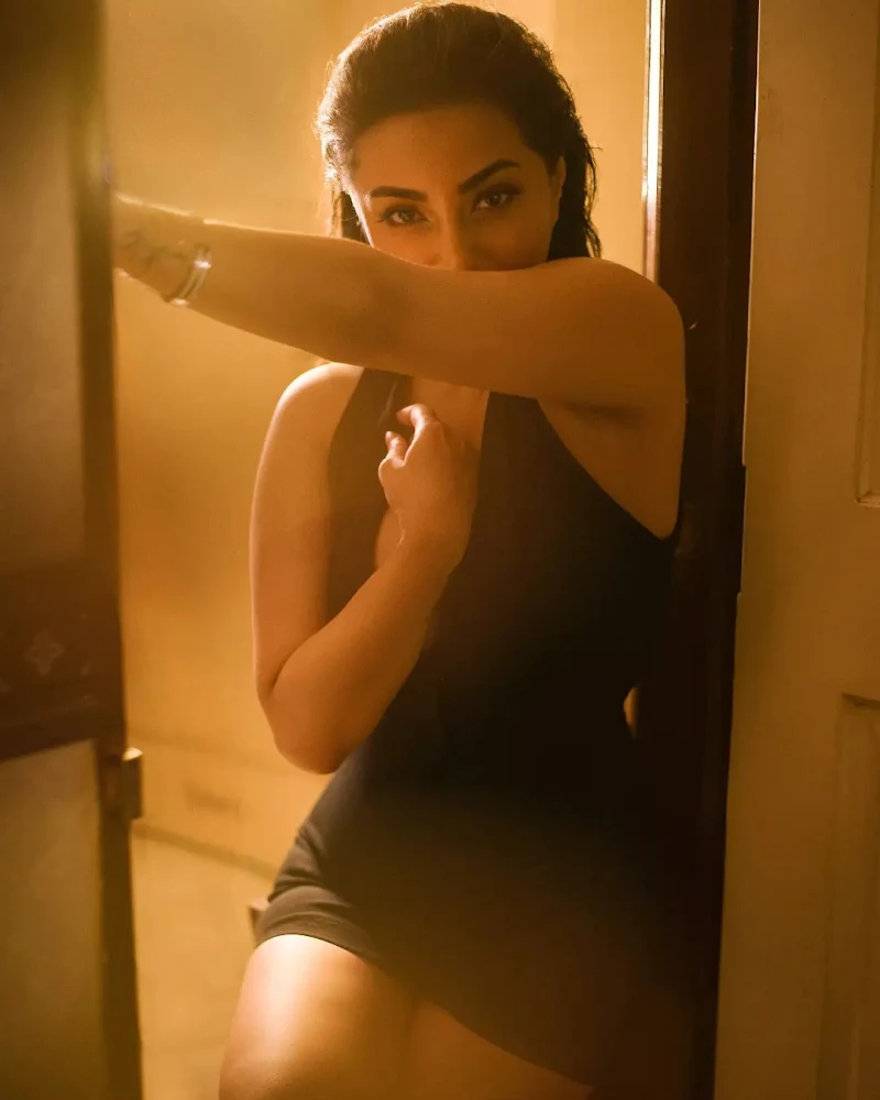 Iira Soni short tight dress cleavage