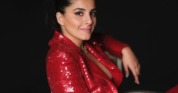 Isha Talwar goes braless in shimmery red pantsuit – see pics.