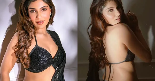 Ishita Raj in black saree with tiny blouse flaunting ample cleavage and sexy back is too hot to handle.