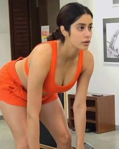 Janhvi Kapoor cleavage orange dress hot actress