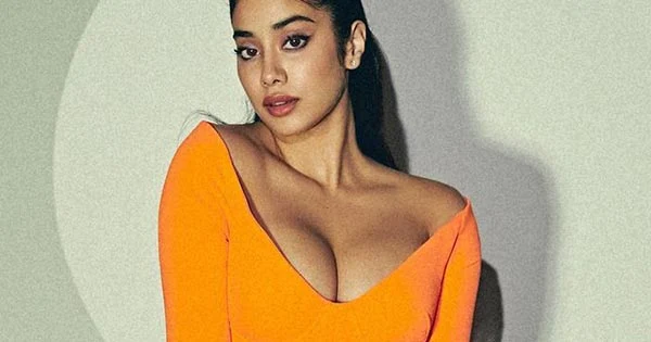 Janhvi Kapoor in this cleavage baring yellow-orange tight fit dress looked too hot to handle – see now.